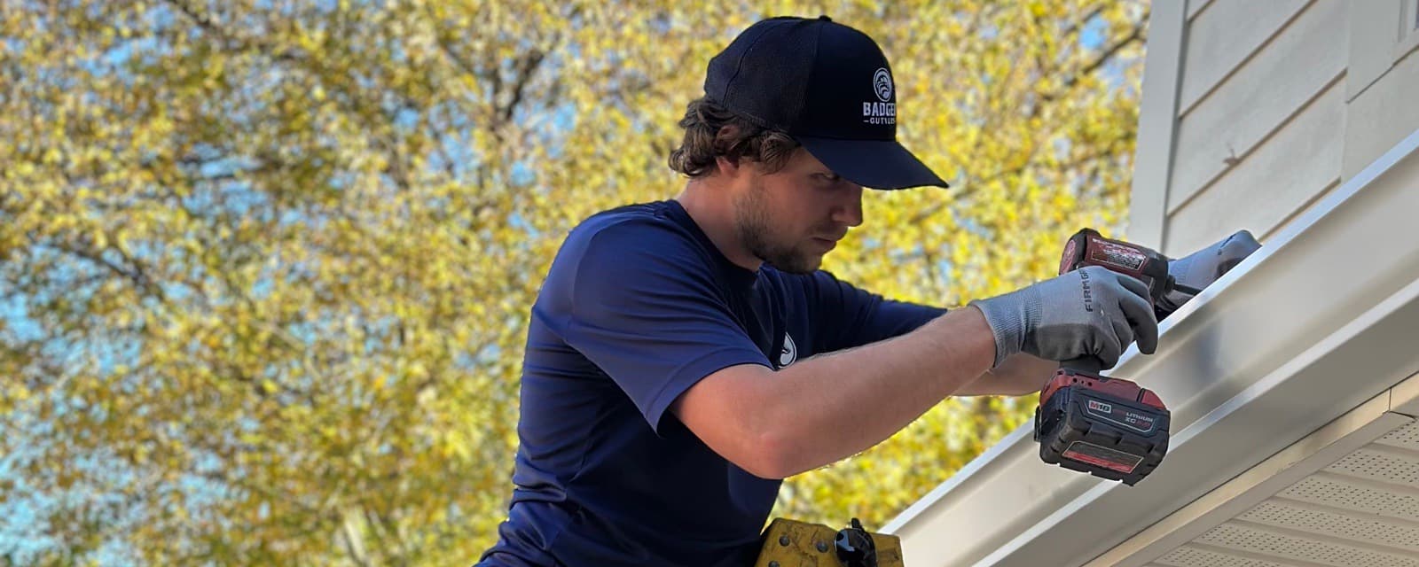 Badger Gutters technician repairing a gutter on a Charlotte, NC home