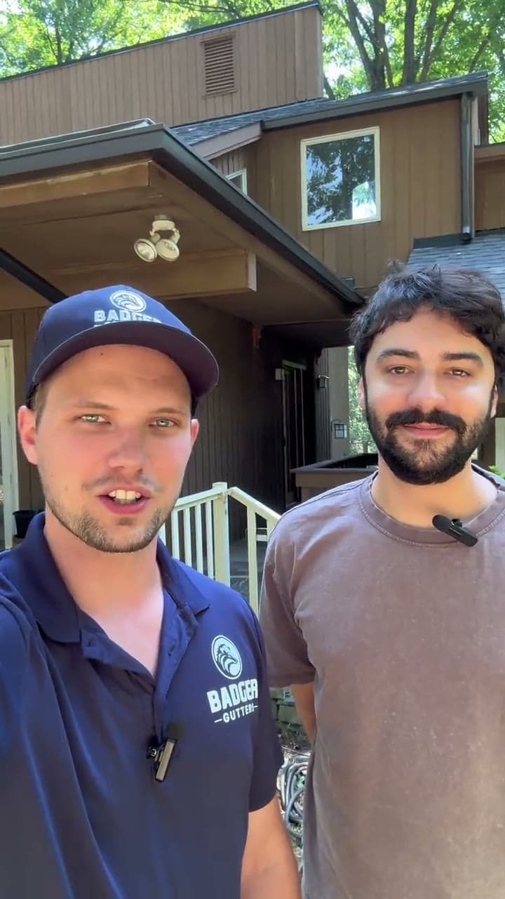 Ben Krupp with Jacob P., a Badger Gutters customer, outside his home in Charlotte, NC